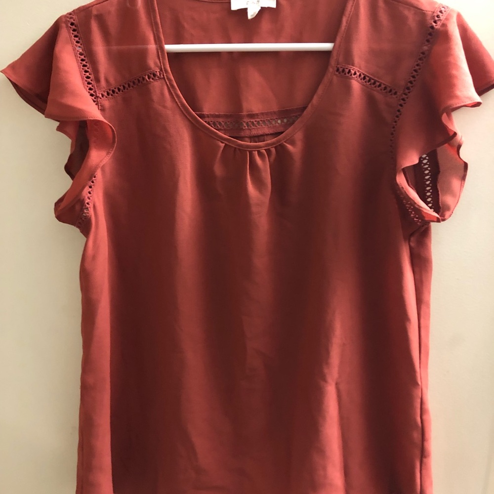 E & M cap sleeve burnt orange blouse.